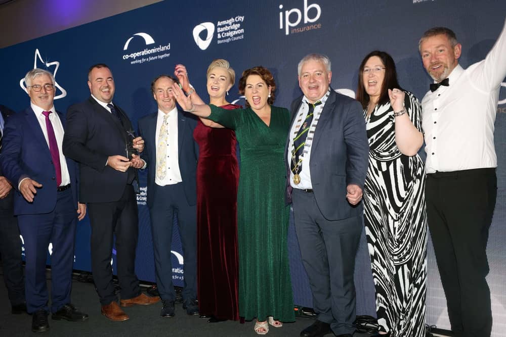 Carndonagh Traders Association accept their award from Trevor Ringland, Co-operation Ireland, and John Hogan, Chairman, IPB Insurance