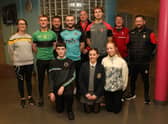 Former primary school pupils who graduated from the Cumann na mBunscol programme pictured with Gaelic Promotion officers.