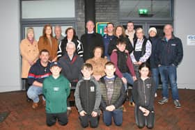 Ned and Noreen Ryan (seated) who officially opened the Borrisokane Defibrillator in memory of their son Derek, surrounded by their family.