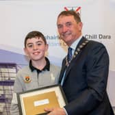 Niall Buggle (LEFT) being presented with a Youth Participation Award at the ceremony by Cathaoirleach / Fianna Fáil councillor Daragh Fitzpatrick (RIGHT). Photo supplied by Kildare County Council.