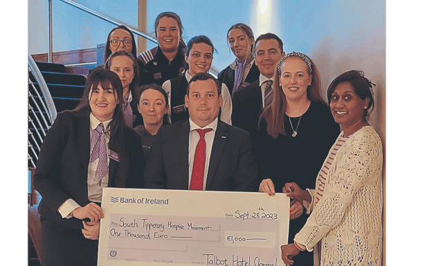 William Burke, Talbot Hotel manager, Laura Jones, Sales and Marketing Manager Talbot hotel and hotel staff hand over funds to Sinaida Jansen, South Tipperary Hospice after a successful fundraiser held