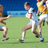 Cian Cassidy on the attack for Fr Manning Gaels in facing the challenge of Kenagh defender Lee Ross Gill. Action from the IFC semi-final on Sunday Photo: Syl Healy