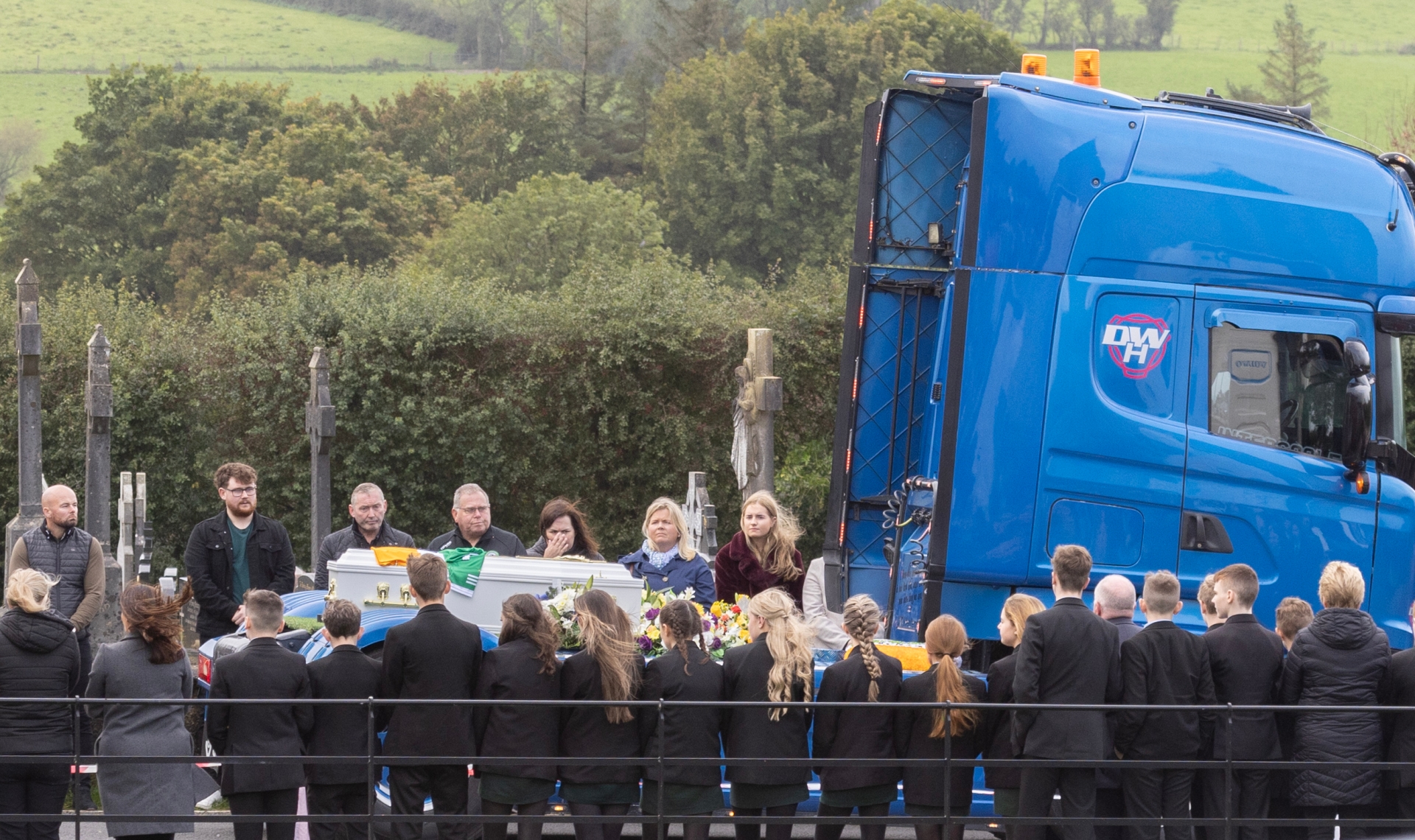 The remains of young Ronan Wilson is carried in St Mary's Church in one his the family trucks.  (NW Newspix)