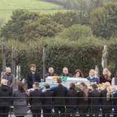The remains of young Ronan Wilson is carried in St Mary's Church in one his the family trucks.  (NW Newspix)