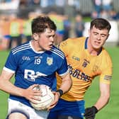 Aidan Grant, Roche taking on Kilkerley's Conor Quigley. Pics: Arthur Kinahan