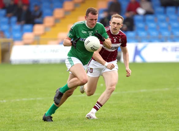 Conor Shields on the attack for Clonguish in breaking away from Mullinalaghta opponent Patrick Fox. Action from the SFC quarter-final at Glennon Brothers Pearse Park on Sunday evening Photo: Syl Healy