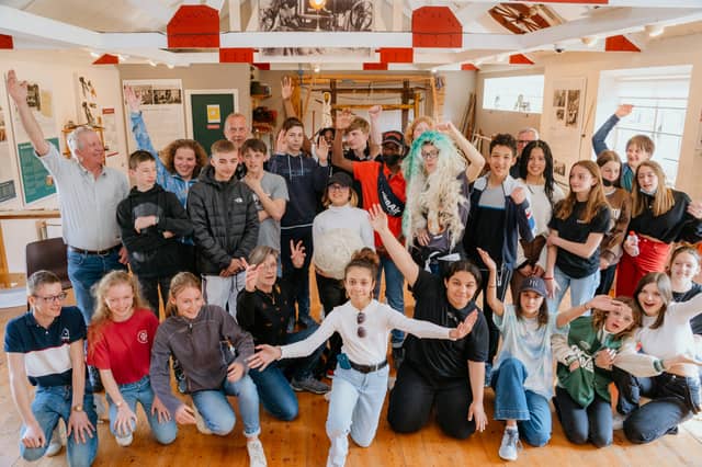 A European tour group visiting the Connemara Sheep and Wool Centre