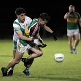 Ardagh Moydow defender Diarmuid  Farrell and Killashee attacker Dylan Farell in a battle for the ball. Action the IFC Round 6 clash at McGann Park on Friday night last Photo:  Syl Healy
