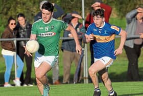 Matthew Carey on the attack for Clonguish in breaking away from Dromard defender Dylan McCormack.  Action from the SFC Round 3 clash at Lynch Park Photo: Photo: Syl Healy