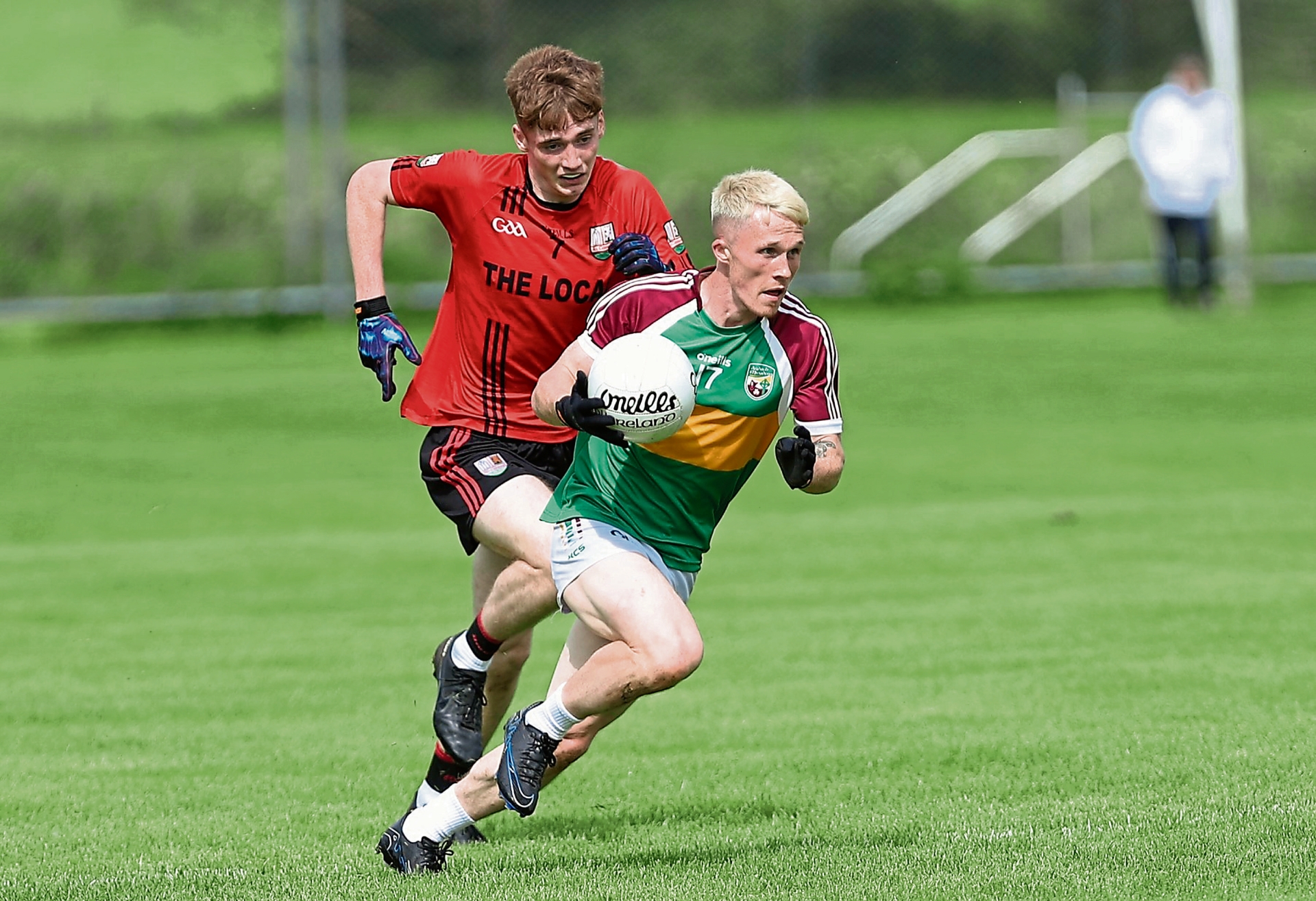 Aaron McTiernan on the attack for Ardagh Moydow with Cashel defender Aidan Mulvihill in pursuit. Action from the IFC Round 3 clash at Leo Casey Park on Sunday Photo: Syl Healy