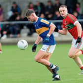 Joseph Hagan surging forward for Dromard with Mostrim opponent Tiarnan Hussey in pursuit. Action from the SFC Round 1 clash on Friday night last Photo: Syl Healy