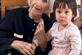Oldest and youngest... Mary celebrating her 100th birthday in Ballinamult with her great-grand-niece Lily who had made the long journey all the way from Singapore for the momentous occasion