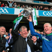 JP McManus and John Kiely lift the Liam MacCarthy Cup high into the sky I PICTURE: Sportsfile