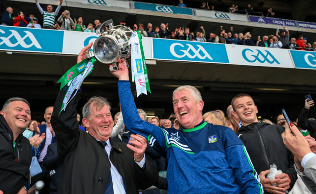 JP McManus and John Kiely lift the Liam MacCarthy Cup high into the sky I PICTURE: Sportsfile
