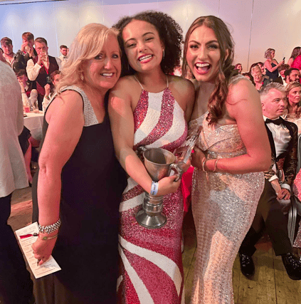 17-year-old Madeline Blackwell (centre), winner of the AIMS Best Actress Award 2023, stars as Tiffany in the Excel Youth Theatre’s Back to the 80’s. Also included Ruth and Nicole Butler.