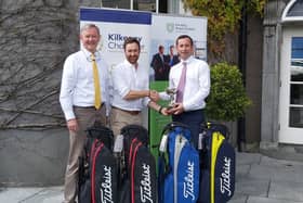 Karl O’Donnell, EY, representing the Winners, being presented with the Chamber Golf Trophy and first prizes, by Chamber CEO John Hurley and Owen Sweeney from PKHL, Main sponsors of the event