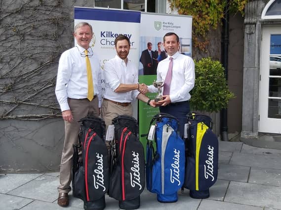 Karl O’Donnell, EY, representing the Winners, being presented with the Chamber Golf Trophy and first prizes, by Chamber CEO John Hurley and Owen Sweeney from PKHL, Main sponsors of the event