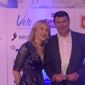 Aldi store manager, Shane Mellett collecting his award  from Emma Cahill, Brand Director at Glenhaven Foods
