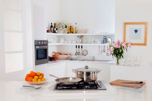 If you have blank wall space, you don’t necessarily need to buy large pieces of furniture, such as dressers and cupboards, to fill it.