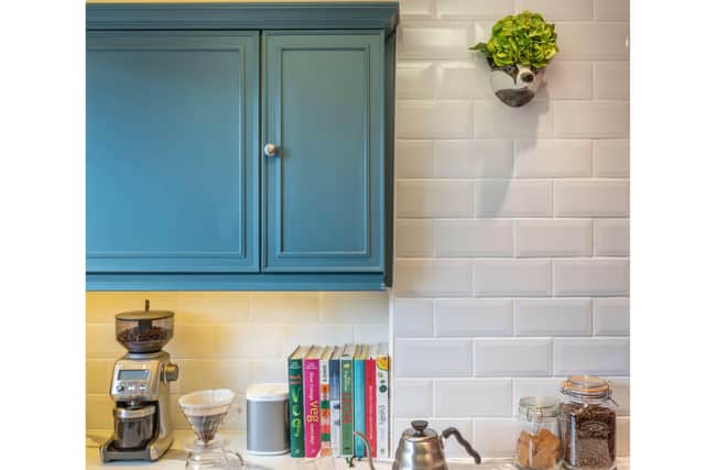 But if your budget doesn’t allow for new cabinetry, she says painting them yourself can be the more affordable alternative, providing the same effect.