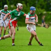 Joe Fitzpatrick attacking with Dean Carey looking to dispossess Photo Denis Byrne