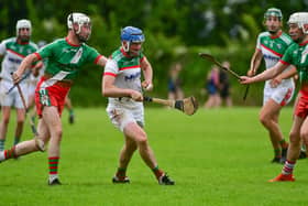 Joe Fitzpatrick attacking with Dean Carey looking to dispossess Photo Denis Byrne