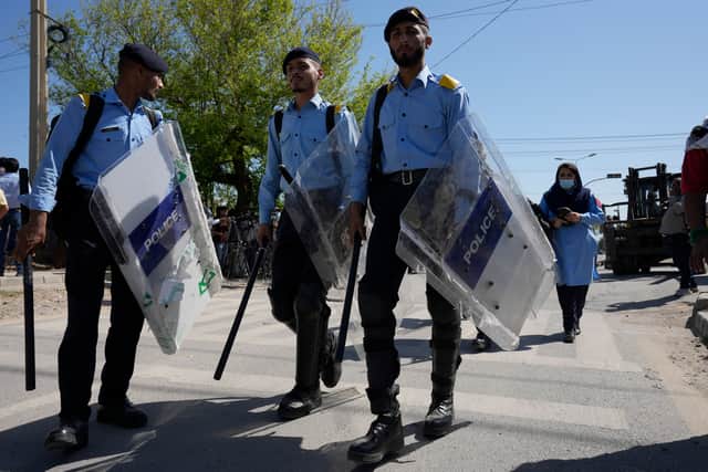 His Pakistan Tehreek-e-Insaf party called for demonstrators to remain peaceful hours after mobs, angered over the mid-trial arrest, set fire to the residence of a top army general in the eastern city of Lahore.