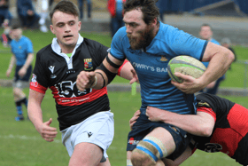 Kevin Kinnane in full flight for Kilfeacle against UCC on Sunday last at Morrissey Park.