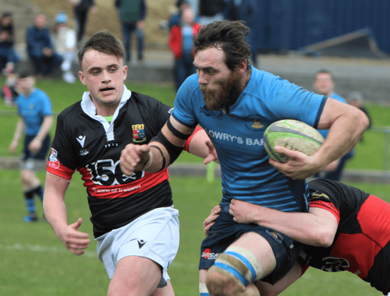 Kevin Kinnane in full flight for Kilfeacle against UCC on Sunday last at Morrissey Park.