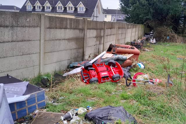 Furniture is mixed in with rubbish in big piles after apparently being pegged over a wall at the rear of St Fintan's Terrace / Fr O'Connor Cresent and Rushall housing estates in the town. MORE BELOW PICTURE.