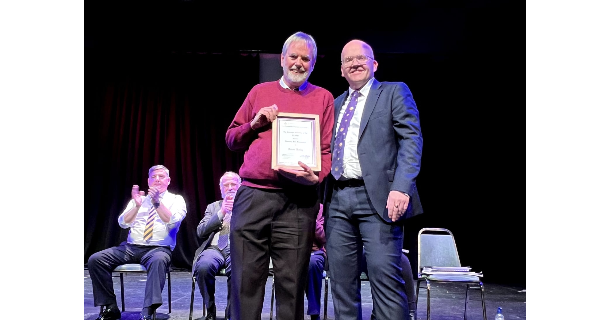 Ardee Senior Band member Kevin Reilly receiving an honorary life membership award