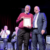 Ardee Senior Band member Kevin Reilly receiving an honorary life membership award