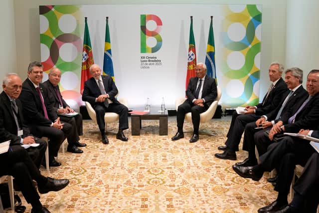 While in Portugal, the left-wing leader aims to secure about a dozen agreements on trade and migration.