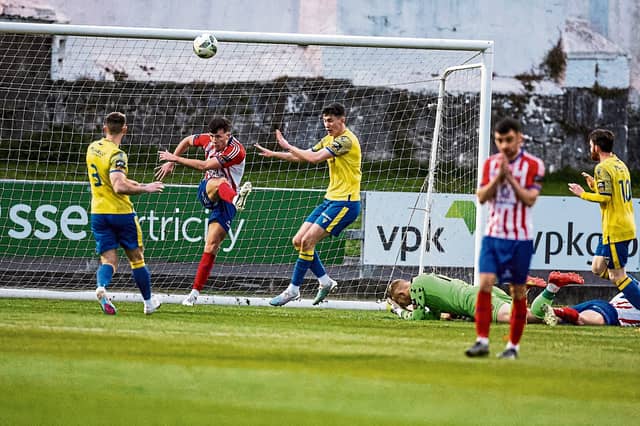 Goalmouth action from the Treaty United v Longford Town SSE Airtricity League First Division clash at the Markets Field on Friday night