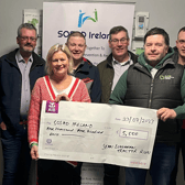 Organising Committee presenting the cheque to Marie Kennedy, SOSAD Fundraising & PR Coordinator