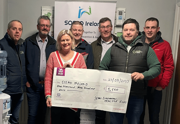 Organising Committee presenting the cheque to Marie Kennedy, SOSAD Fundraising & PR Coordinator