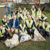 A giant pick-me-up message from Caherconlish NS principal Patrick Ryan; Aoife Butler, teacher and Green School’s co-ordinator, and pupils | PICTURE: Brian Arthur