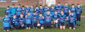 THE FUTURE ON THE HILL: The  boys and girls who make up the Kilfeacle & District  Under 9 Rugby squad  prior to a recent game at Morrissey Park, Kilfeacle