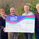 Sheila Duffy, Director of Income Generation and Communications, and Donall Henderson, CEO at Foyle Hospice, Click Energy's Andy Porter, Managing Director and Philip McDaid, Finance Director.