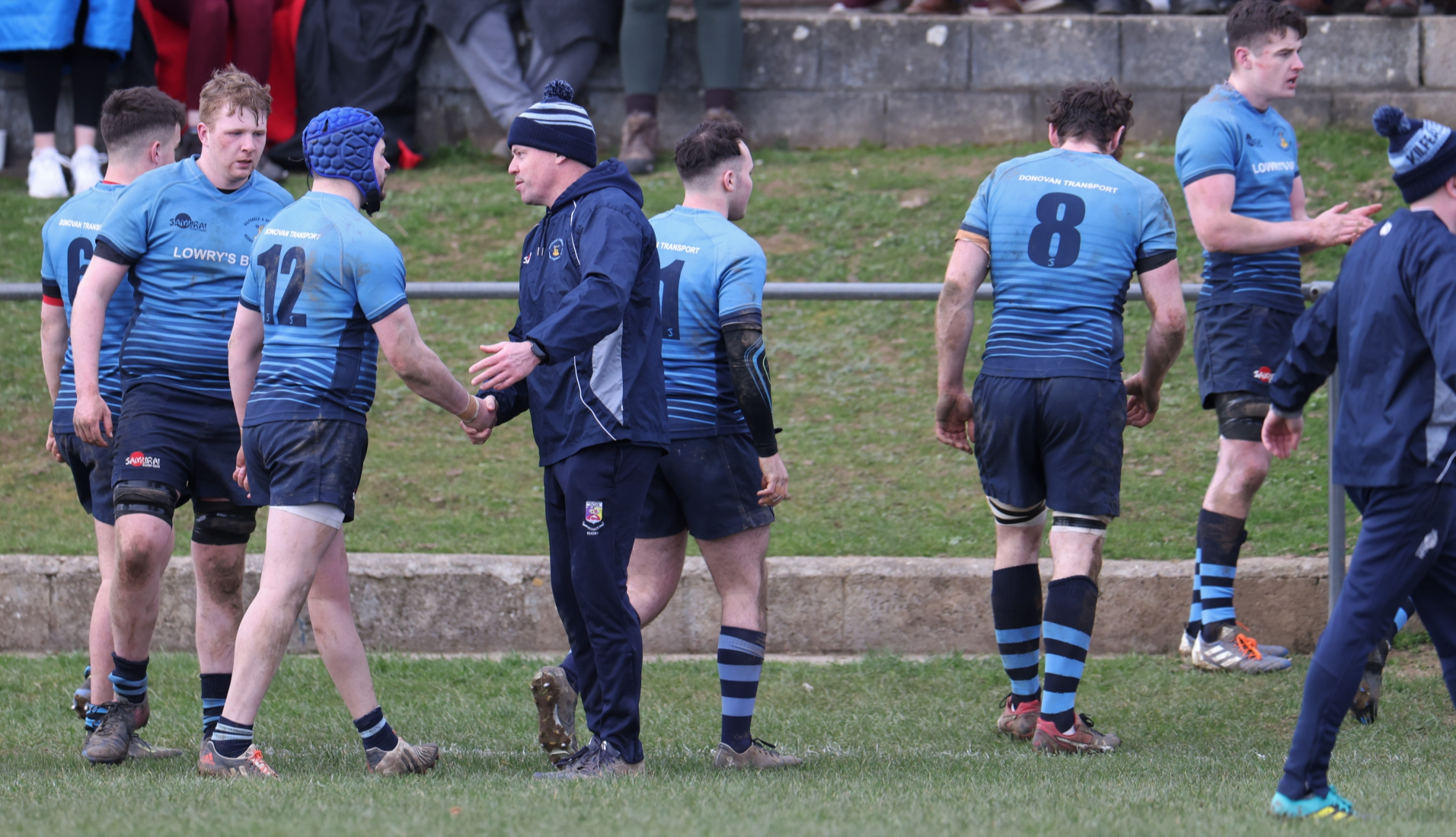 The Boys in Blue of Kilfeacle are congratulated as they walk from Morrissey Park after defeating Cork Constitution in the Munster Junior Cup on Sunday last. Pic: Vincent Flynn