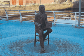 The bronze statue of the late broadcaster, Terry Wogan at Howley's Quay in Limerick city centre |  PICTURE: TLC.