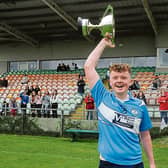 The late Ronan Moran lifts the Cup after he captained Allen Gaels to win the 2020 Leitrim Minor Football Championship title