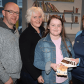 Sadhbh Feely presenting the money she raised from a recent fundraiser to Norita Kemp, a volunteer with NOVAS, also present, Sadhbh's parents, Brian and Elaine Feely Picture: Adrian Butler