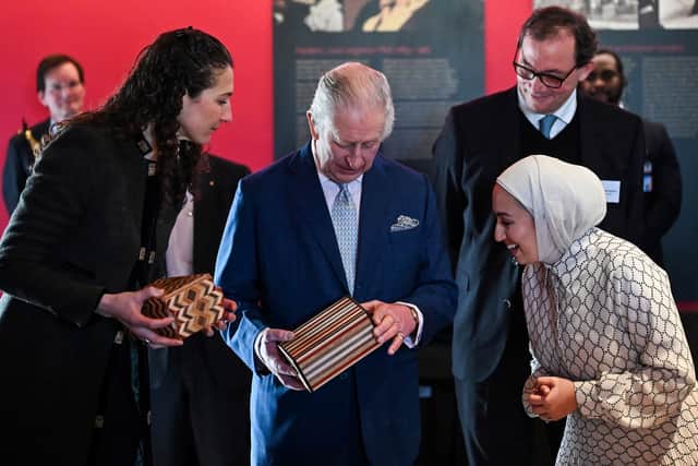 When he was asked to try to open a small wooden box made by Ibrahim Khdoj, a Syrian craftsman helped by Turquoise Mountain, and decorated with a geometric marquetry pattern, he turned it in his hands and laughed as he tried to find the secret catch.