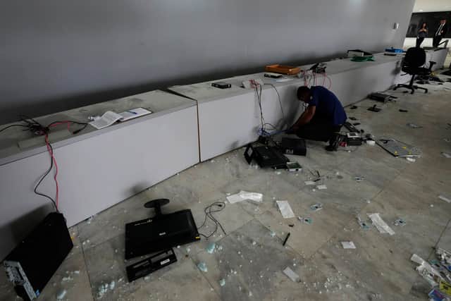 Police broke down a pro-Bolsonaro encampment outside a military building on Monday and detained some 1,200 people there, the justice ministry’s press office told the Associated Press (AP).