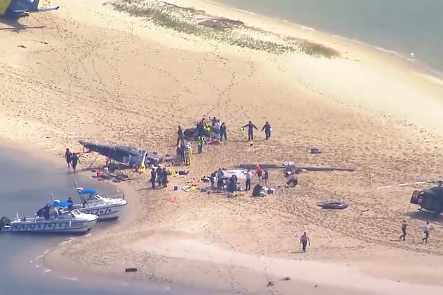 Footage of the crash showed a helicopter shortly after take-off being clipped by another aircraft flying over the water.