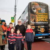 Pictured with Fr Seamus Enright are Marie King and Dylan O'Donnell, Cillian McGrath, Faye Frawley and Grace Geary, | PICTURE: Keith Wiseman