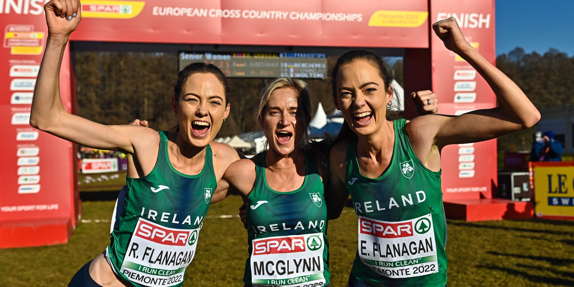 Roisin Flanagan, Ann-Marie McGlynn, and Eilish Flanagan, celebrate after winning bronze in the senior women's 8000m during the SPAR European Cross Country Championships. Photo: Sam Barnes/Sportsfile