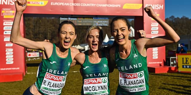 Roisin Flanagan, Ann-Marie McGlynn, and Eilish Flanagan, celebrate after winning bronze in the senior women's 8000m during the SPAR European Cross Country Championships. Photo: Sam Barnes/Sportsfile