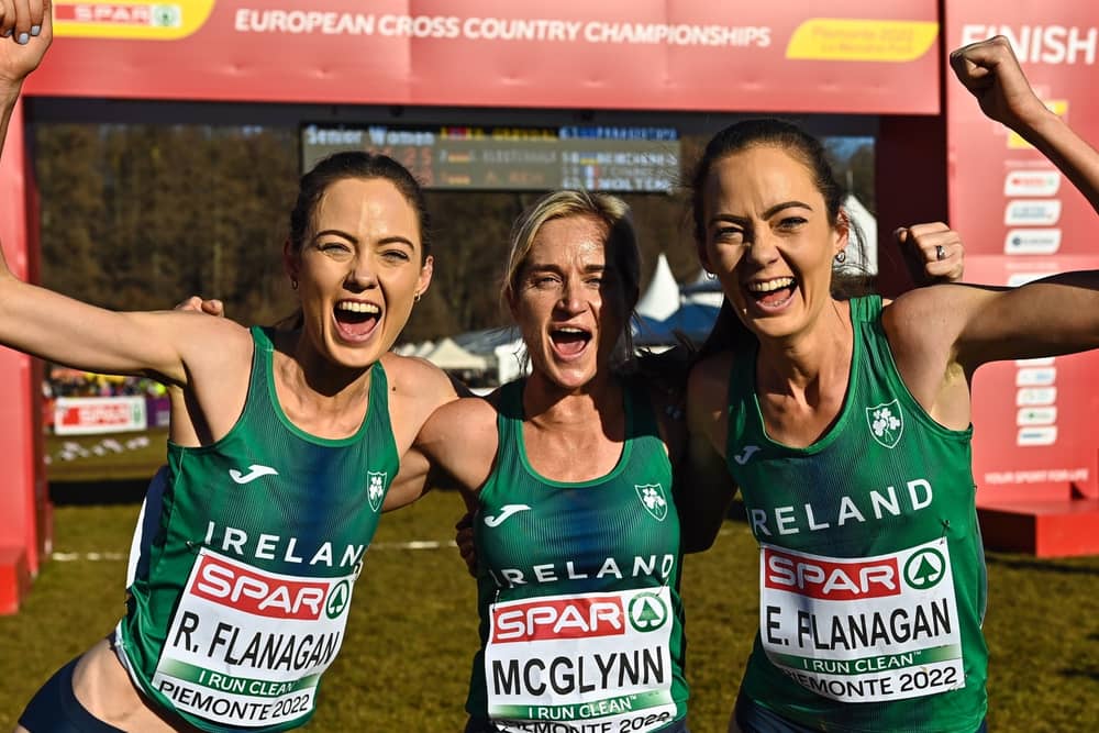 Roisin Flanagan, Ann-Marie McGlynn, and Eilish Flanagan, celebrate after winning bronze in the senior women's 8000m during the SPAR European Cross Country Championships. Photo: Sam Barnes/Sportsfile